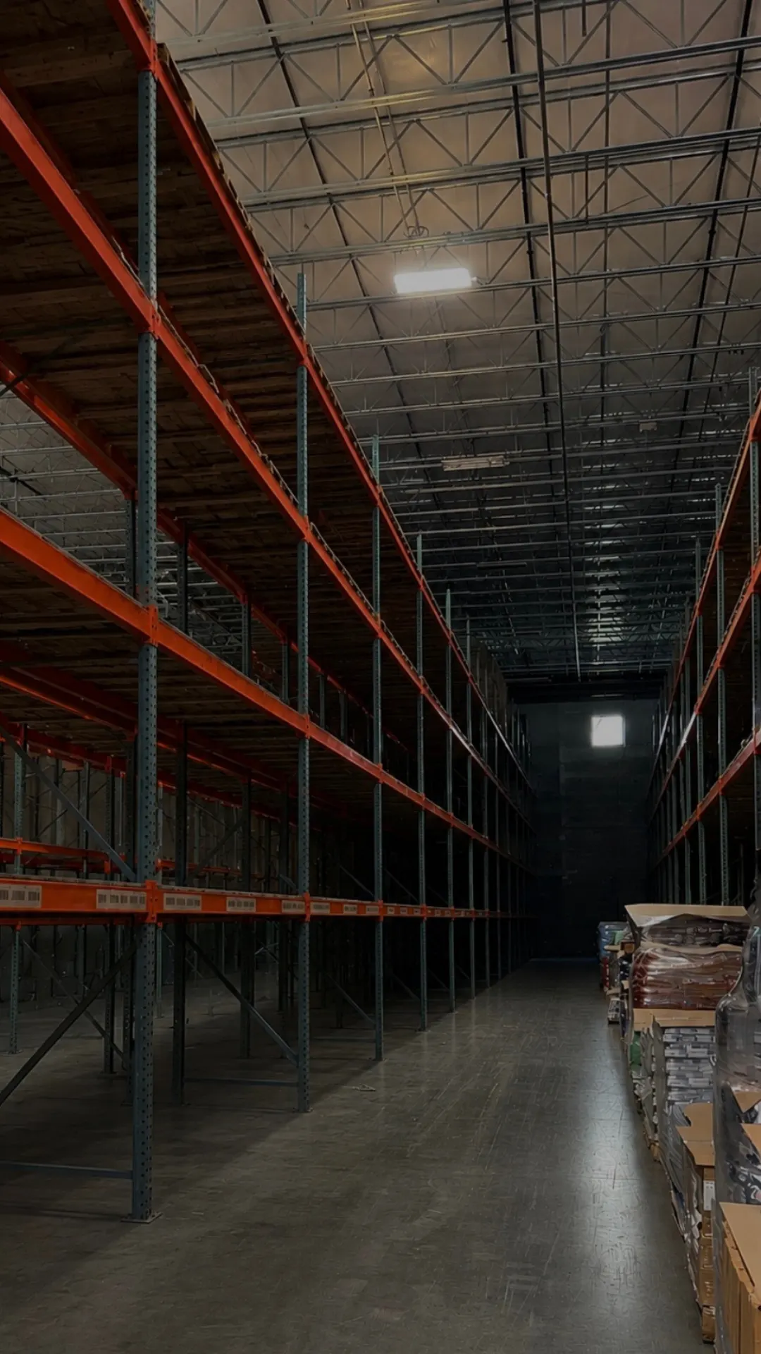 Open pallet racking bays ready for incoming inventory